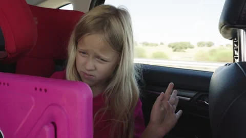 Child using tablet during road trip Stock Footage 319872522