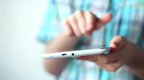Child using tablet pc.Teenager boy using touch pad Stock Footage 46904724