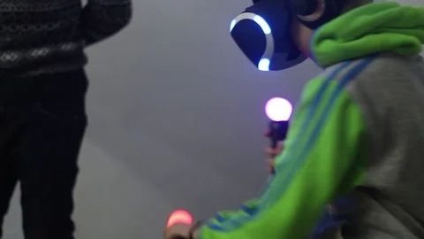 Child is using virtual reality helmet Stock Footage 81790333