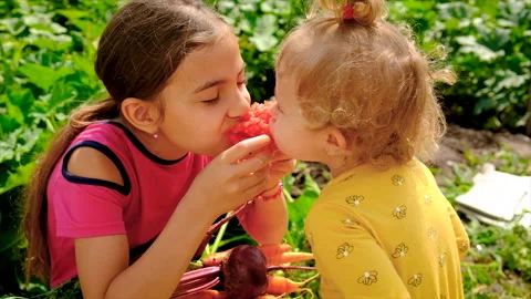Child in the vegetable garden. selective focus. Stock Footage 204077953