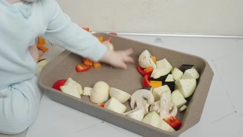 Child with vegetables Stock Footage 272676084