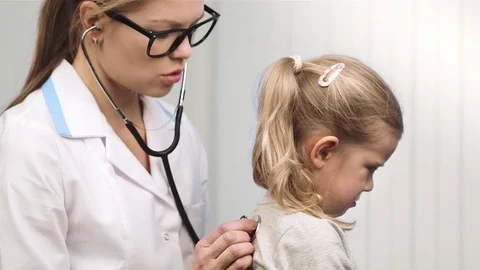 Child visiting doctor Stock Footage 72399900