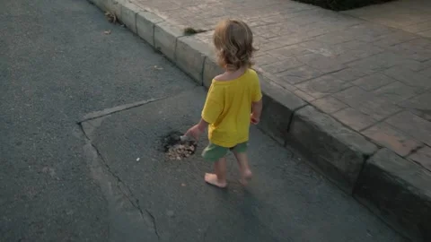 Child Walking Barefoot Stock Footage 300905227
