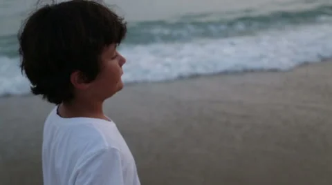 Child walking on beach Stock Footage 40053202