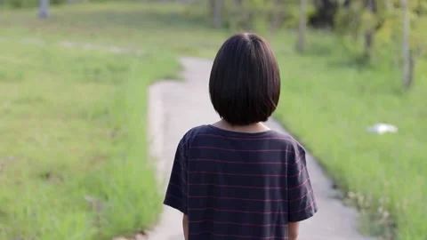 A child walking forward in the park Stock Footage 224431787