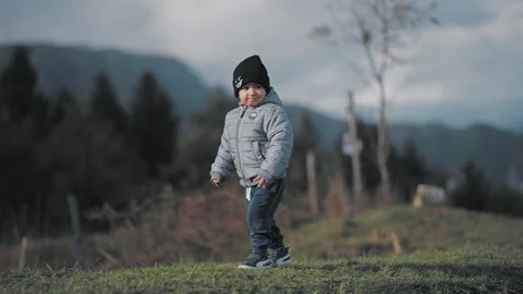 Child walking on hill Stock Footage 254003409