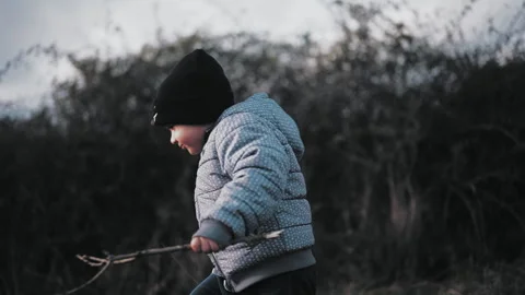 Child walking on hill Stock Footage 254003942