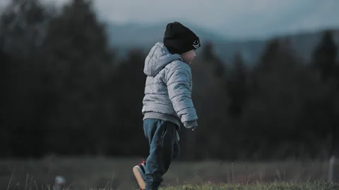 Child walking on hill Stock Footage 254004822