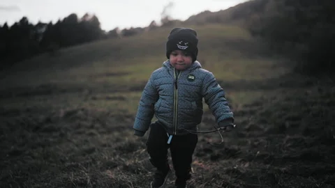 Child walking on hill Stock Footage 254005295