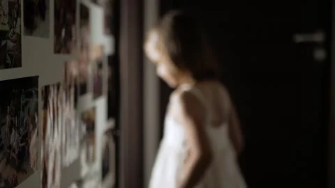 Child walking into room from the dark Video stock 263126346