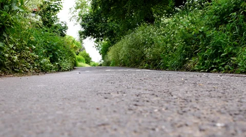 Child walks down the road Stock Footage 39076687
