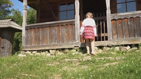 The child walks the yard Stock-Footage 79588784