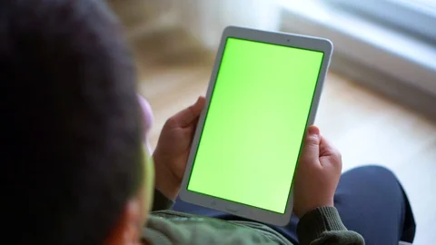 Child watching tablet vertically Stock Footage 107091560