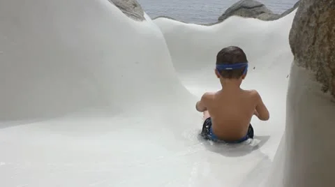 Child on water slide Stock Footage 11633591