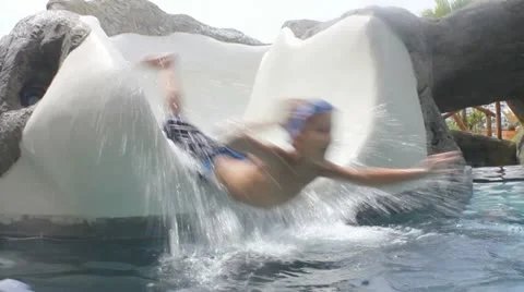 Child on water slide Stock Footage 11633605