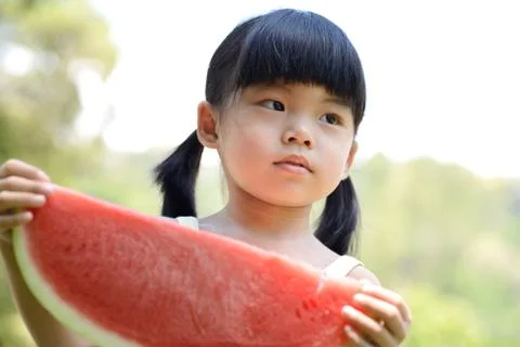 Child with watermelon Stock Photos