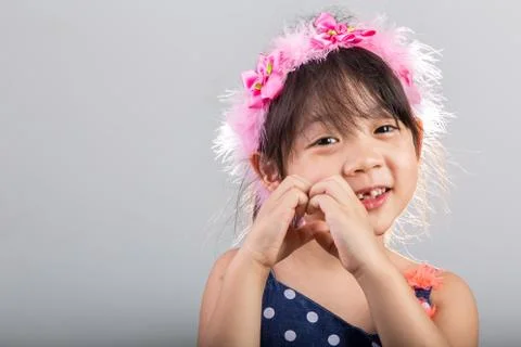 Child Wearing Flower Crown / Little Girl with Flower Crown Stock Photos