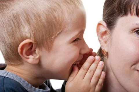 Child whispering Stock Photos