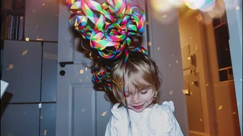Child with windmill toy on head Stock Footage 160127348