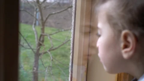 Child by the window Stock Footage 127444713