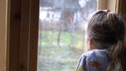Child by the window Video stock 127448209