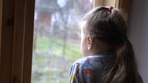 Child by the window Stock Footage 127448516