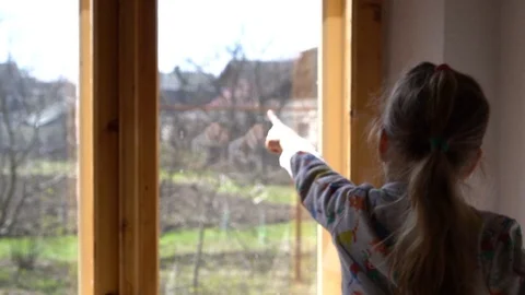 Child by the window Stock Footage 127448644