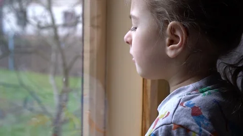 Child by the window Stock Footage 127449084