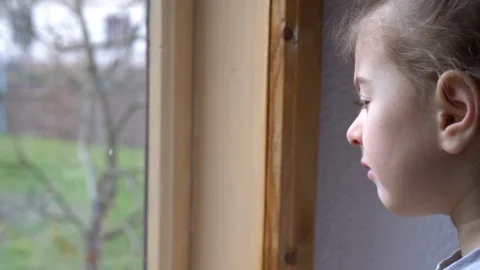Child by the window Stock Footage 127449101
