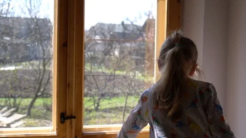 Child by the window Stock Footage 127449261