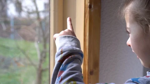 Child by the window Stock Footage 127449338
