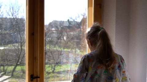 Child by the window Stock Footage 127449940