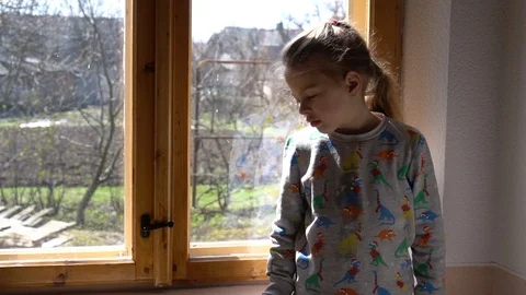 Child by the window Stock Footage 127450106