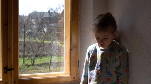 Child by the window Stock Footage 127450407