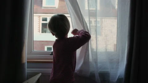 Child at window Stock Footage 154306932