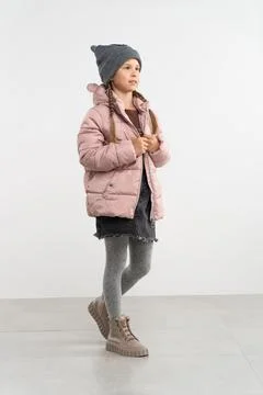 Child in winters clothes in studio 스톡 사진