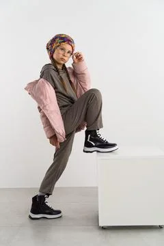 Child in winters clothes in studio 스톡 사진