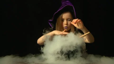 Child in witch costume Stock Footage 22664059