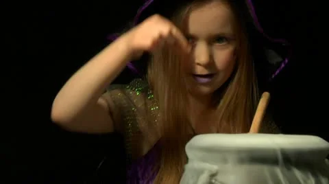 Child in witch costume Stock Footage 22664074