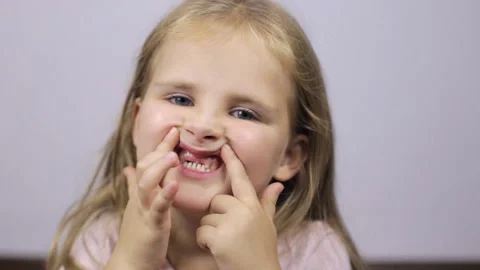 Child without front teet Stock Footage 99505819