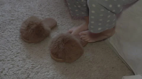 Child woke up in bed and gets up Stock Footage 323210627