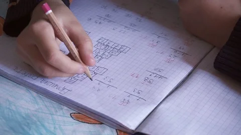Child Working On Math Homework Stock Footage 99102174