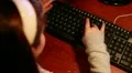 A child write on keyboard HD Footage