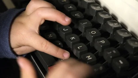 Child write on old typewriter Stock Footage 81716379