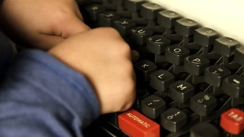 Child write on old typewriter Stock Footage 81716403