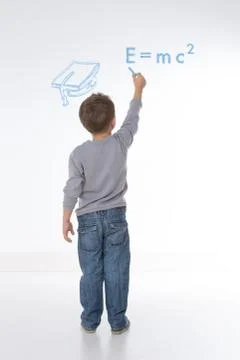 Child writes maths formula Stock Photos