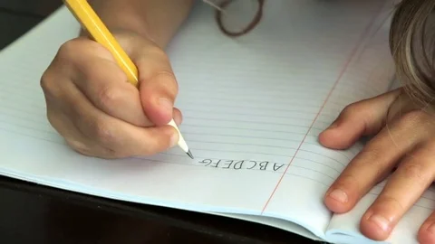 Child writing abc's 스톡 동영상 75916576