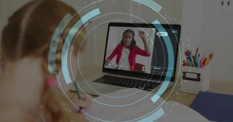 Child writing notebook while laptop tutor raising hand causing HUD overlay with 스톡 사진