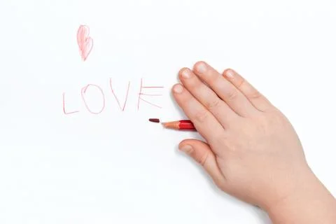 Child wrote love Stock Photos