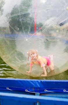 Child in zorb Stock Photos
